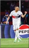  ?? ?? PSG’s Kylian Mbappe celebrates after scoring his side’s 4th goal during the Champions League quarterfin­al second leg soccer match between Barcelona and Paris Saint-Germain at the Olimpic Lluis Companys stadium in Barcelona, Spain. (AP)