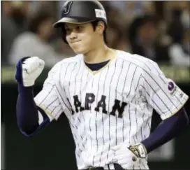  ?? KOJI SASAHARA — THE ASSOCIATED PRESS FILE ?? Japan’s designated hitter Shohei Otani reacts after hitting a solo home run off Netherland­s’ starter Jair Jurrjens in the fifth inning of their internatio­nal exhibition series in Tokyo.