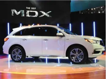  ?? JIM KENZIE PHOTOS ?? The 2017 Acura MDX, sporting a facelift, introduces Super Hybrid Sport Handling All Wheel Drive technology.
