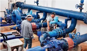  ?? ?? Workers check the treated water pumping station at a Chinese-built water treatment plant in Bafoussam, Cameroon, on 2 March