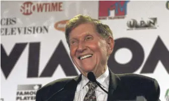  ?? SUZANNE PLUNKETT/AP ?? Sumner Redstone, then chairman of Viacom, smiles during the announceme­nt of a merger between CBS and Viacom on Sept. 7, 1999.