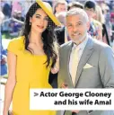  ??  ?? &gt; Actor George Clooney and his wife Amal