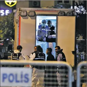  ?? AP/EMRAH GUREL ?? Turkish police officers prepare to enter Saudi Arabia’s Consulate on Monday in Istanbul.