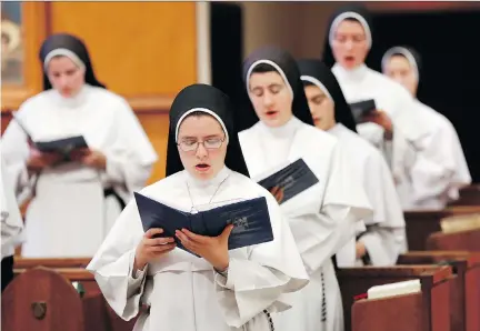  ?? THE ASSOCIATED PRESS ?? With simple faith-themed songs — some traditiona­l, some obscure and some original — members of Dominican Sisters of Mary, Mother of the Eucharist are topping Billboard’s classical chart. Tracks on their latest album represent the music of 10 countries.