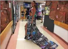  ?? LESLIE KROWCHENKO – DIGITAL FIRST MEDIA ?? Eliza McCarthy modeled a Junk to Funk gown designed by Nicolette Moore. Both are seniors at Upper Darby High School. They were taking part in Saturday’s Brad Schoener Festival.