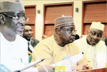  ?? PHOTO: LUCY LADIDI ATEKO ?? Director- General, National Emergency Management Agency ( NEMA), Mustapha Habib Ahmed ( left); Director, Human Resources Management, Musa Zakan and Director, Relief and Rehabilita­tion, Alhassan Nuhu, during an investigat­ive hearing at the National Assembly complex in Abuja… yesterday.