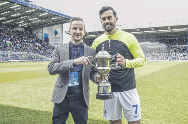  ?? ?? Marlon Pack is presented with The News/sports Mail’s Pompey Player of the Season award by The News’ sports reporter Jordan Cross