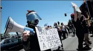  ?? JANE TYSKA — STAFF ARCHIVES ?? People rally for Mali Watkins, a Black man detained for dancing in the streets in May, at the Alameda Police Department in Alameda on June 11.