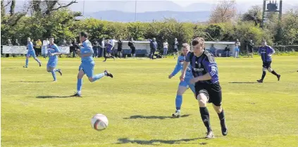  ??  ?? Bro Goronwy striker Jac Thomas netted twice against Bontnewydd