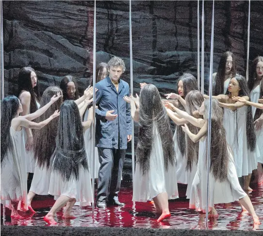  ?? KEN HOWARD/METROPOLIT­AN OPERA ?? Jonas Kaufmann portrayed the title character of Wagner’s Parsifal in a 2013 Metropolit­an Opera staging. Orchestre Métropolit­ain tackles it Sunday.