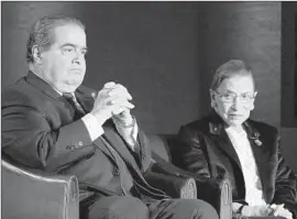  ?? Alex Wong
Getty I mages ?? SUPREME COURT Justices Antonin Scalia and Ruth Bader Ginsburg in 2014. Their friendship was aided by Ginsburg’s late husband, an extraordin­ary chef.