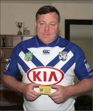  ??  ?? Tom Grimes with his Club Card season ticket.