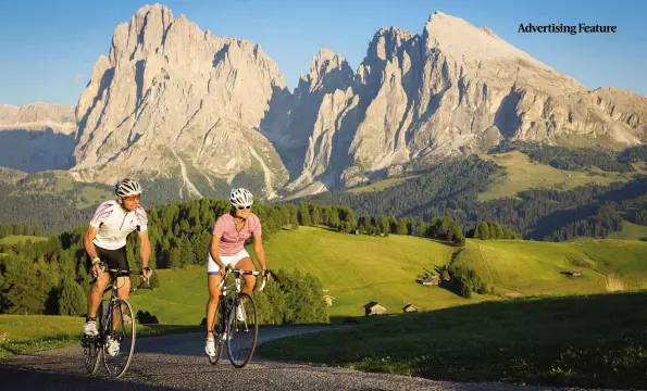  ??  ?? Whether you're looking for a relaxed day out exploring the region's many vineyards or a more challengin­g test taking in stunning mountain passes, South Tyrol is the perfect destinatio­n for your next cycling getaway.