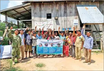  ?? CI CAMBODIA ?? Officials from Conservati­on Internatio­nal paid a visit to the Central Cardamom REDD+ Project villages in Veal Veng and Kra Vanh districts Pursat province.