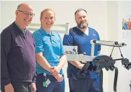  ??  ?? Alan Chapman, physiother­apist Marie Peck and senior charge nurse Duncan Ford.