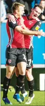  ??  ?? JOY: Rhys Oates celebrates after scoring the opener