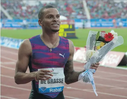  ?? STRINGER/AFP/GETTY IMAGES ?? Canada’s Andre De Grasse won the 200-metre race at the IAAF Diamond League Mohammed VI Athletics meeting in Rabat on July 16 and was looking in top shape heading into the IAAF World Championsh­ips in London, only to suffer a hamstring injury in practice...