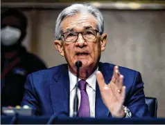  ?? GRAEME JENNINGS/POOL VIA AP ?? Fed Chair Jerome Powell took pains Tuesday to rebuff suggestion­s from some Democratic senators that interest rate increases would slow hiring and potentiall­y leave many people without jobs.