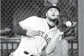  ?? Brett Coomer / Staff photograph­er ?? If Marisnick’s plate prowess ever approached his fielding skills and earned him everyday duty, his teammates believe he would be a shoo-in for a Gold Glove.