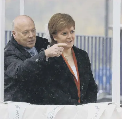  ?? ?? 0 Nicola Sturgeon with Jim Mccoll at the 2017 ‘launch ceremony’ for MV Glen Sannox at Ferguson’s shipyard