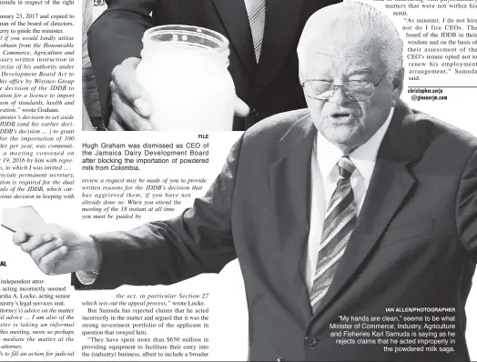  ?? FILE IAN ALLEN/PHOTOGRAPH­ER ?? “My hands are clean,” seems to be what Minister of Commerce, Industry, Agricultur­e and Fisheries Karl Samuda is saying as he rejects claims that he acted improperly in the powdered milk saga.