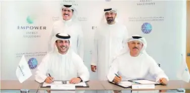  ?? ?? ↑
Sheikh Ahmed Bin Saeed Al Maktoum and Saeed Mohammed Al Tayer witness the signing ceremony.