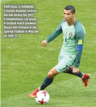  ??  ?? PORTUGAL’S FORWARD Cristiano Ronaldo controls the ball during the 2017 Confederat­ions Cup group A football match between Russia and Portugal at the Spartak Stadium in Moscow on June 21.