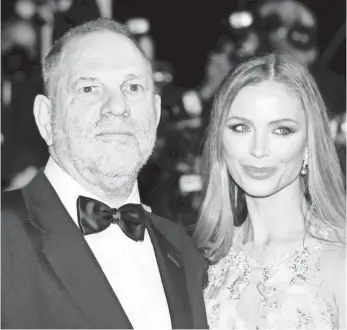  ??  ?? Harvey Weinstein and Georgina Chapman have been married since 2007. In an interview published Thursday, Weinstein told the New York Post she is “100% behind me.”