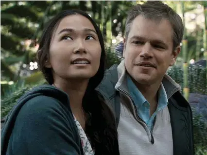  ?? Paramount Pictures via AP ?? Hong Chau, left, was nominated for a Golden Globe for best supporting actress for her role in the film “Downsizing.” Matt Damon, right, also appears in “Downsizing.”