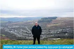  ?? ?? RHONDDA, UK: Former miner and local resident Roy Jones poses for a photograph on the hill top above Tylorstown on December 6, 2023 in the Rhondda Valley, south Wales. — AFP Photos