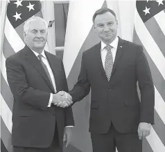  ?? AP Photo/Czarek Sokolowski ?? ■
Rex Tillerson, U.S. Secretary of State, meets Friday with Polish President Andrzej Duda, during a visit to Warsaw, Poland. Tillerson's two-day visit to Poland was to include discussion­s of security and other issues and a visit to a memorial site to...