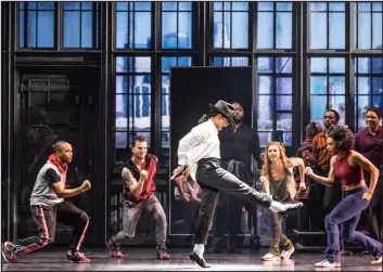  ?? ?? Roman Banks as MJ and the cast of the musical.