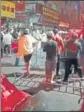  ?? AP ?? People protest in Guangzhou, China, in this image obtained from a video.