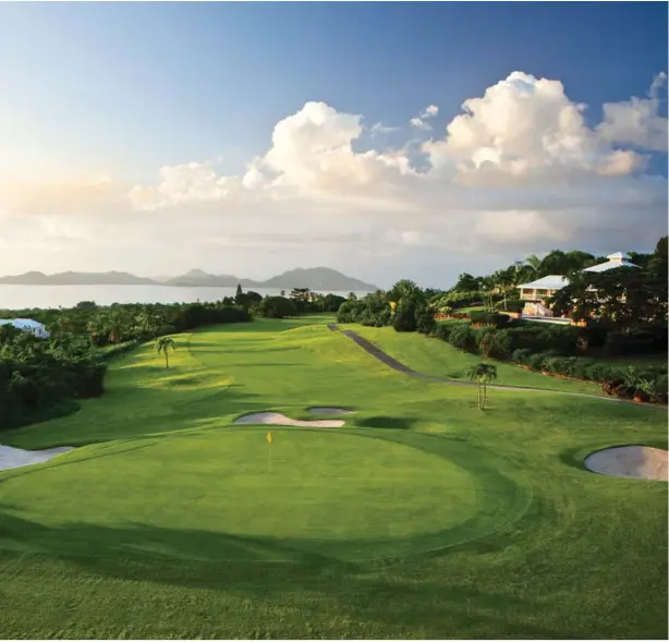  ??  ?? Take advantage of gorgeous views, as well as two compliment­ary weekly clinics and a golfer’s conditioni­ng programme at the Four Seasons’ Robert Trent II Jones course (above). Opposite page: the resort’s peaceful Pinney’s Beach is a sunlover’s paradise...