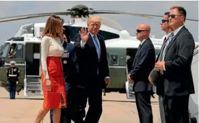  ??  ?? US President Donald Trump and wife Melania wave as they board Air Force One to fly to Saudi Arabia yesterday.