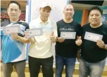  ??  ?? Men’s division winners, from left, Benj Espinosa, Hadi Pacheco, Ed Cordova and Lito Zamudio.