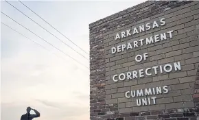 ??  ?? ONLY FOR THE STOUT-HEARTED: A recruitmen­t advertisem­ent outside the Arkansas Department of Correction­s Cummins Unit, which houses the state’s execution chamber, in Arkansas in 2017.