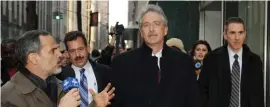  ?? GETTY IMAGES FILE ?? HIGH SPY: Diplomat William Burns, center, is questioned by a reporter from Iranian television in 2010 as he leaves a meeting of six major powers to discuss a response to Iran’s nuclear defiance.