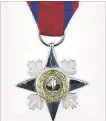  ?? NIAGARA REGIONAL POLICE ?? Photo of the Star of Courage medal, which recognizes acts of conspicuou­s courage in circumstan­ces of great peril.