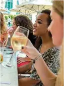  ?? Christophe Viseux / New York Times ?? Women enjoy brunch at a hotel and resort in Dubai, United Arab Emirates.