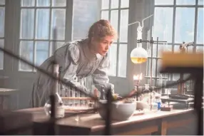  ?? AMAZON STUDIOS ?? Rosamund Pike as Marie Curie in a scene from the film “Radioactiv­e,” now streaming on Amazon Prime.