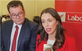  ?? Photo: RNZ ?? Grant Robertson and Jacinda Ardern at the Labour Party conference.