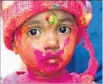  ?? Francois Xavier Marit Getty Images ?? PAINT covers the face of a young participan­t last year.