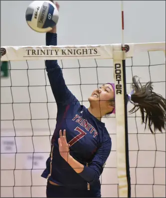  ?? Dan Watson/The Signal (See additional photos on signalscv.com) ?? Trinity Classical Academy’s Paige Kim (7) puts a shot over the net against Holtville on Tuesday at the Henry Mayo Fitness Center in the first round of the CIF State Regional tournament.