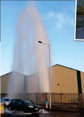  ??  ?? Fountain of waste: A burst main shoots into the air in Wallasey