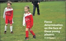  ?? 01 A03footy15 ?? Fierce determinat­ion on the face of these young players.