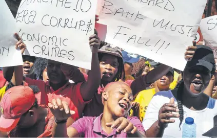  ?? Picture: Jacques Nelles ?? LASHING OUT. Oakbay employees demonstrat­e outside the North Gauteng High Court in Pretoria yesterday. They demand the removal of Finance Minister Pravin Gordhan.