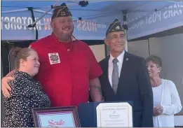  ?? COURTESY OF TEMECULA VALLEY VFW ?? Bryon Lively, commander of the Temecula Valley Veterans of Foreign Wars, Post 4089, was recognized by legislator­s Nov. 2. From left are Amanda Fisher, from the office of state Sen. Melissa Melendez, R-lake Elsinore; Lively; and Rep. Darrell Issa, R-vista.