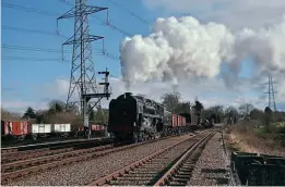  ?? ?? No. 92214 passing the Rothley end of Swithland sidings during the February 26 photograph­ic charter, the day before its boiler ticket expired. MARTIN CREESE