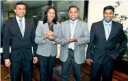  ??  ?? DFCC was represente­d by a team comprising Manohari Gunawardhe­na - Senior Vice President Treasury, Palitha Gamage - Senior Vice President Planning & Plan Implementa­tion, Sanjeewa Fernando - Assistant Vice President Integrated Risk Management and.jayan...